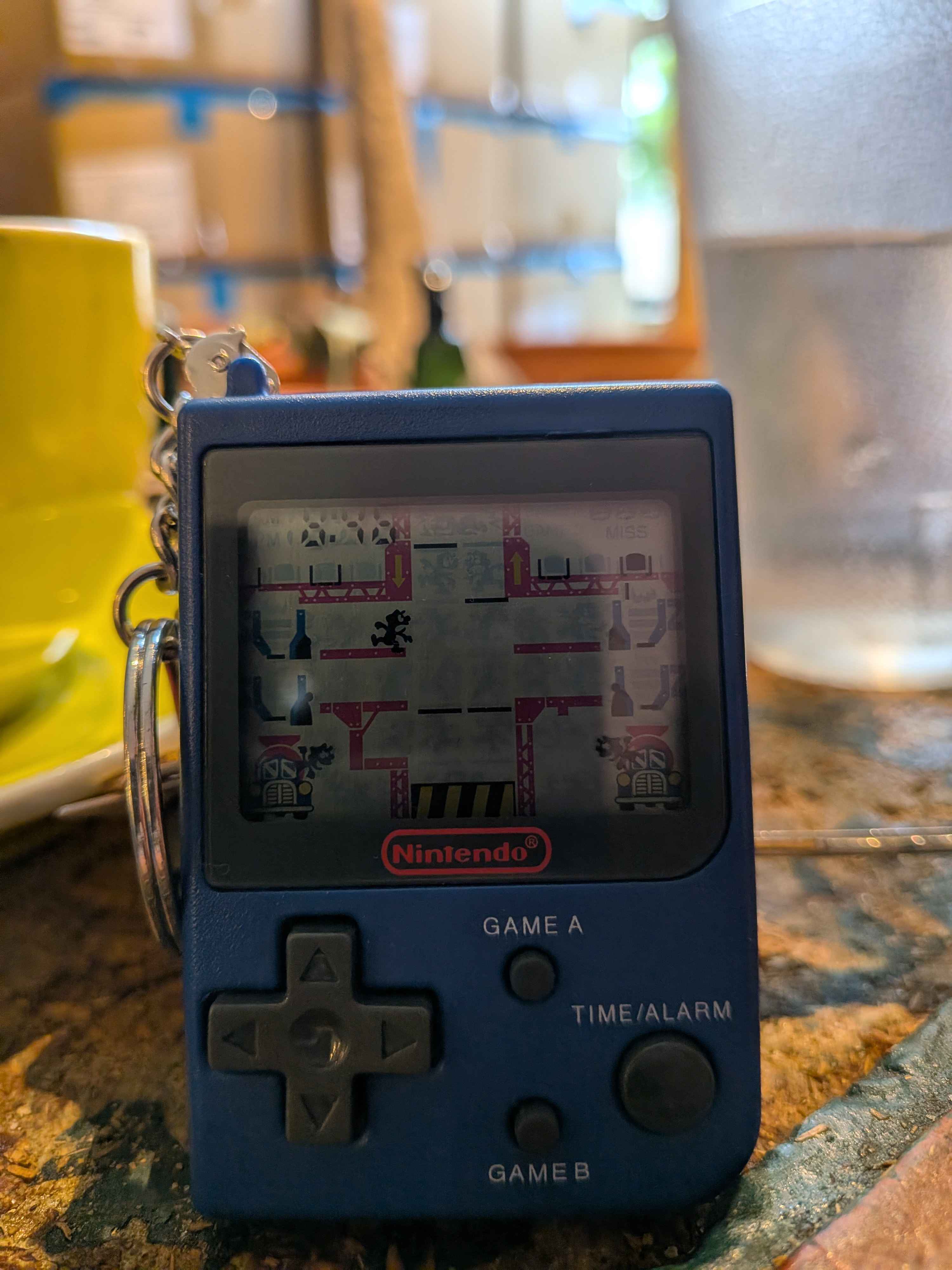 A photo of the keychain out and about at a coffee shop